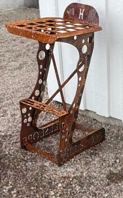 Rostig barstol som är robust